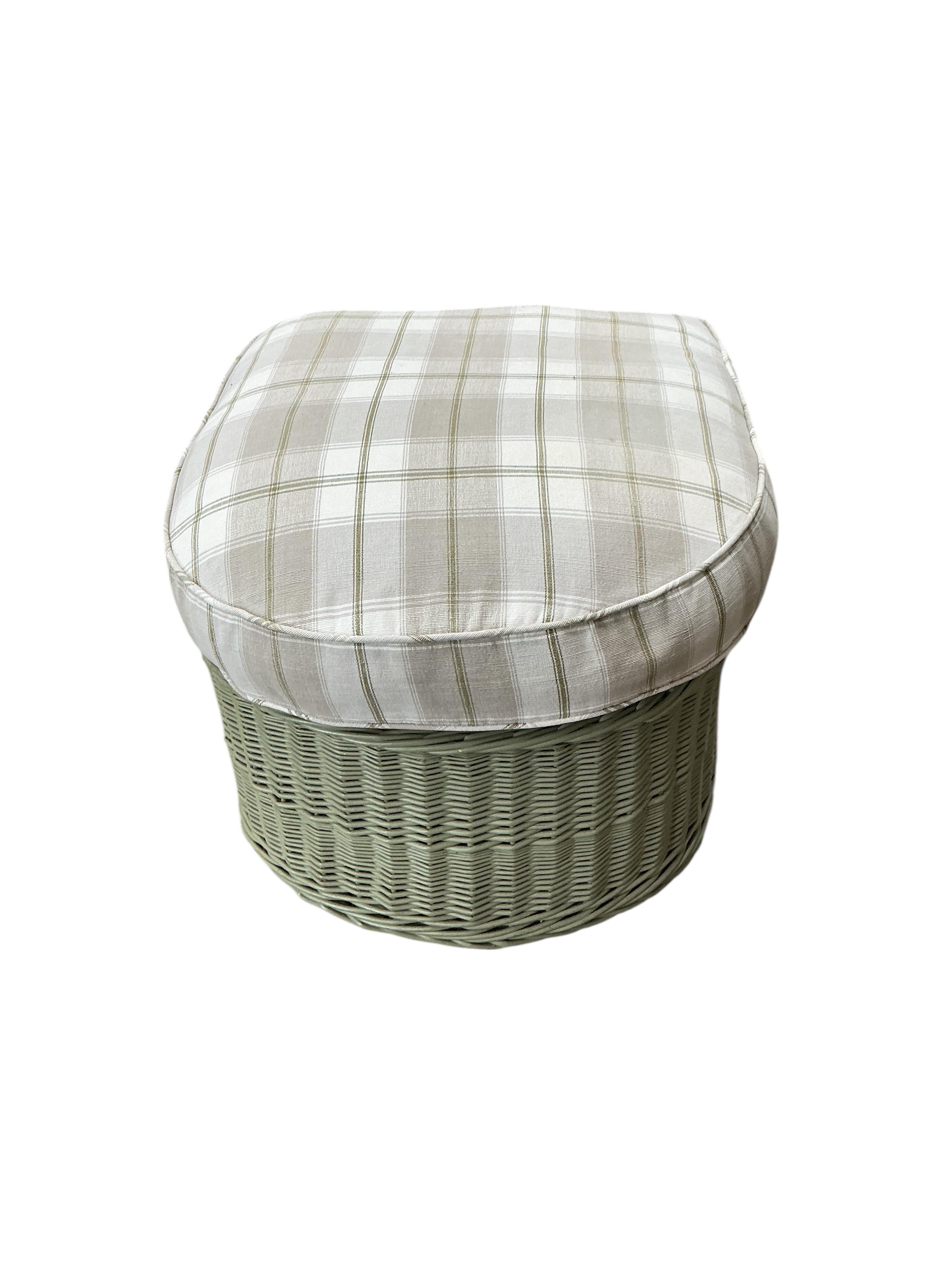 A Contemporary green wicker conservatory suite, comprising three seater settee, armchair, footstool and tray top table